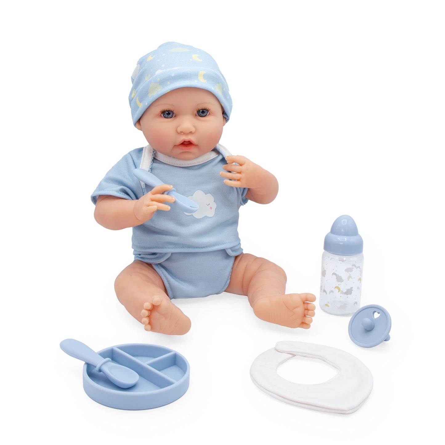 A baby doll wearing a light blue outfit and hat, seated with a bottle, pacifier, bib, and feeding tray on a white background.
