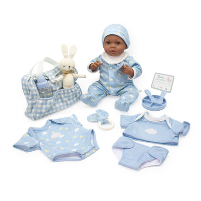 Baby doll with blue outfit and accessories on a white background