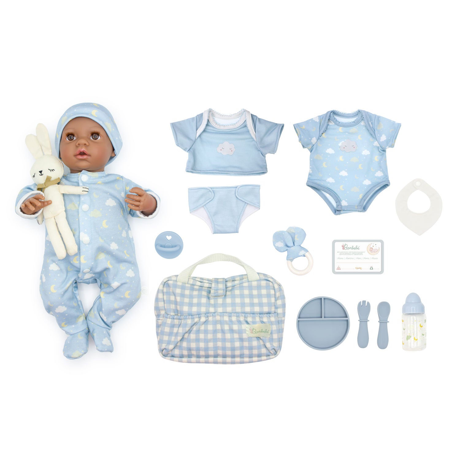Baby doll with accessories including clothes, a bag, and toys on a white background