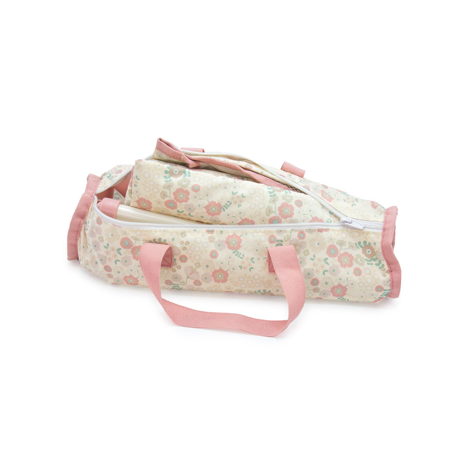 Floral-patterned bag with pink handles on a white background