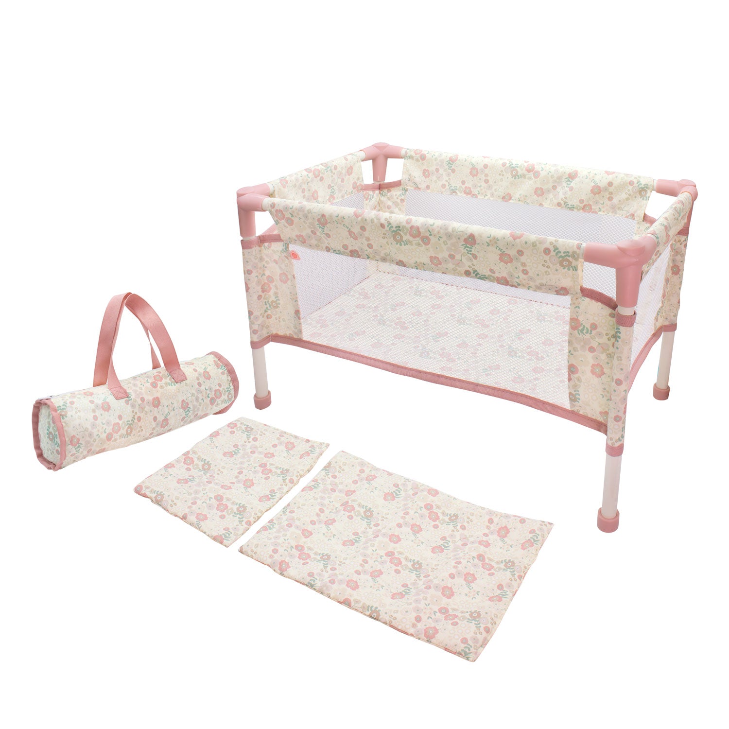 Floral-patterned baby crib set with mattress, bumper, and mat on a white background