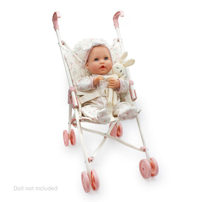 Baby doll in a pink stroller with a white background