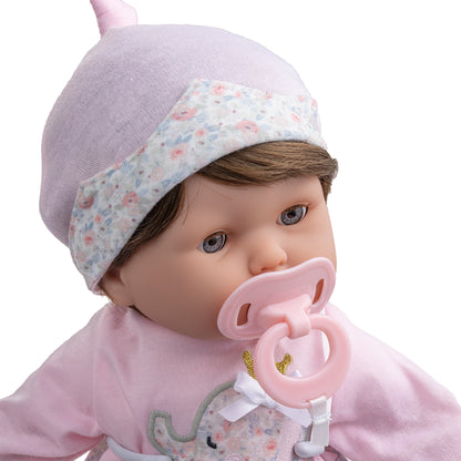 close up of doll with pacifier
