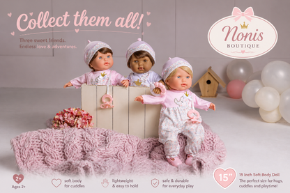 Three dolls in a box with promotional text for Nonis Boutique on a light gray background.