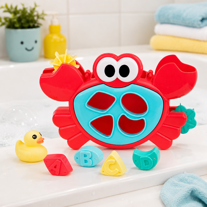 Red crab-shaped bath toy with colorful letters and a yellow rubber duck on a bathroom counter.