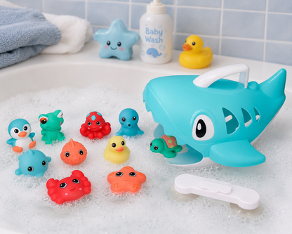Colorful bath toys including a shark-shaped toy and various sea creatures in a bathtub.