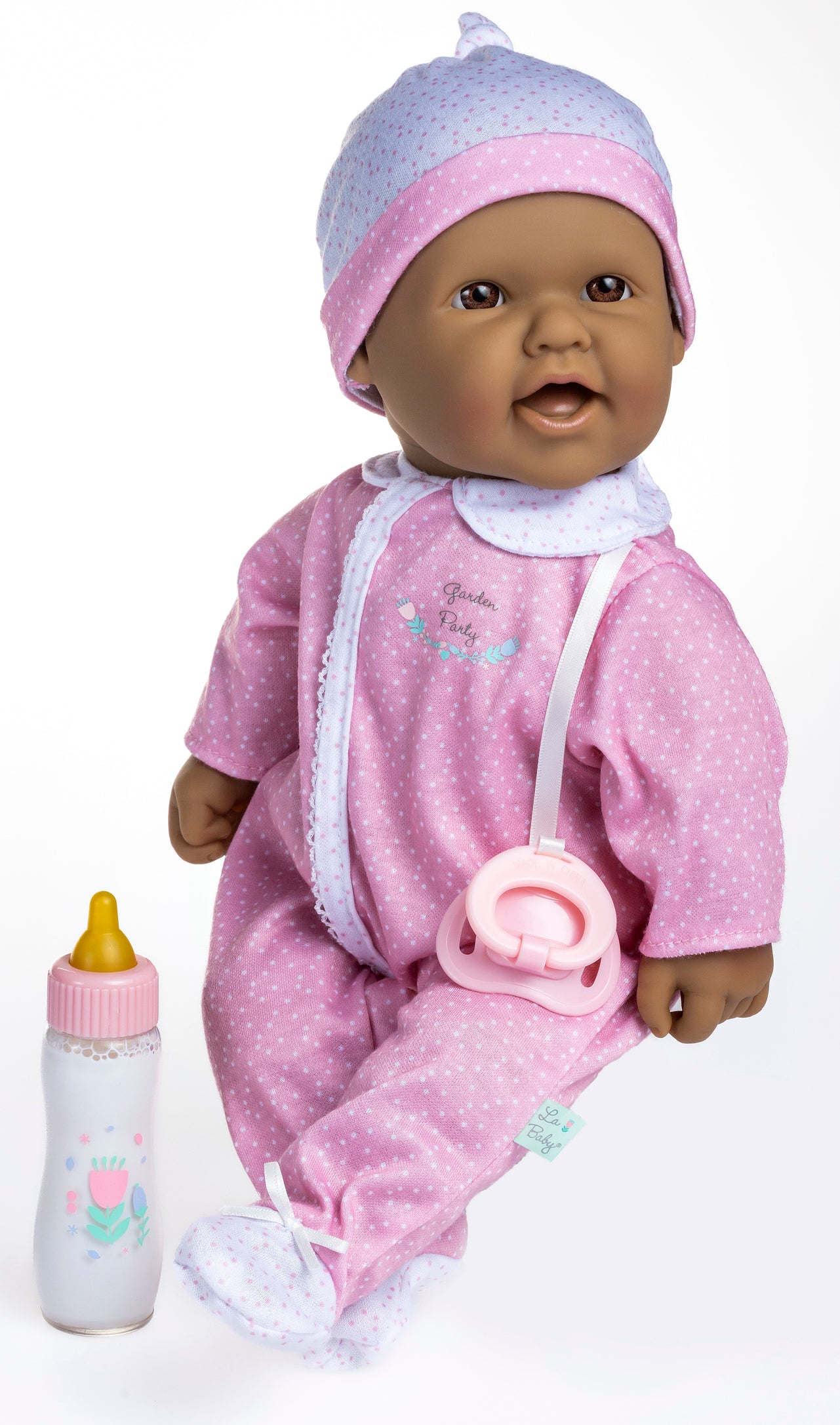 La Baby ® 16" Soft Body Baby Doll Pink/White Onesie w/ Pacifier & Magic Bottle. Hispanic.