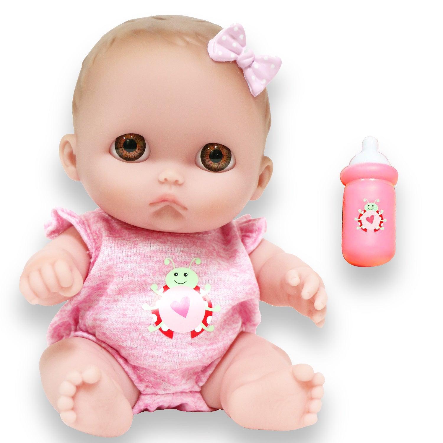 Lil Cutesies, Mimi 8.5" All Vinyl Baby Doll with Brown Eyes and Removable Outfit Ages 2+ - JC Toys Group Inc.