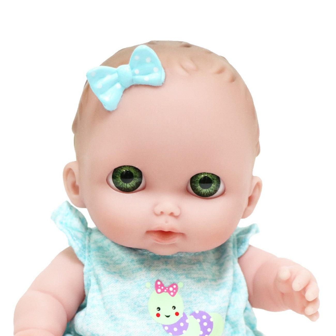 Lil Cutesies, Bibi 8.5" All Vinyl Baby Doll with Green Eyes and Removable Outfit Ages 2+ - JC Toys Group Inc.