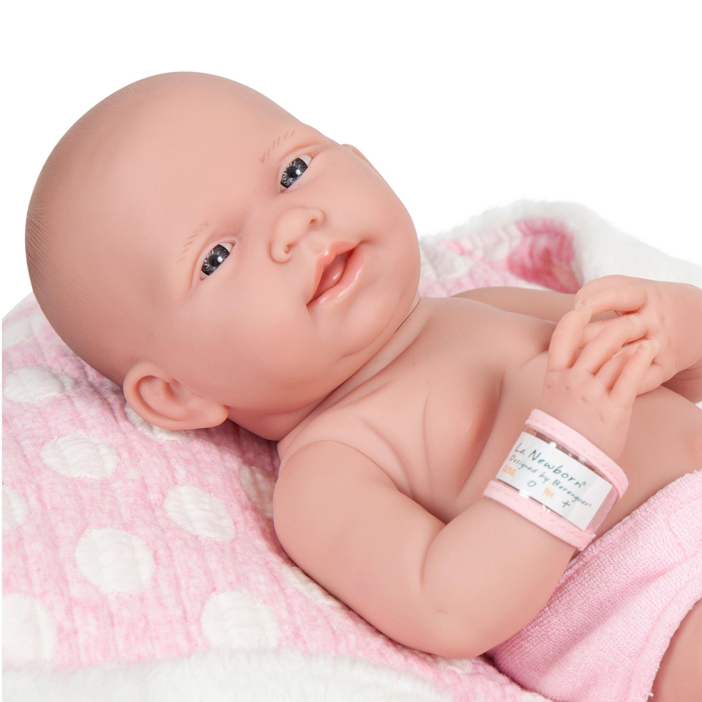 JC Toys, La Newborn AllVinyl Real Girl 15in Baby Doll-Pink with White Polka Dots - JC Toys Group Inc.